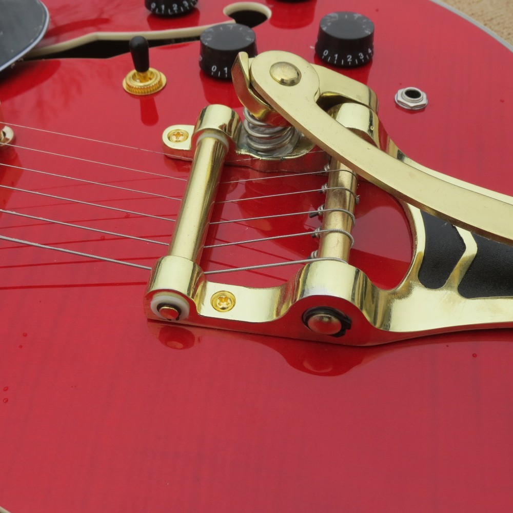 2017 hollow body electric guitar quilt flame on body top and back ,Natural wood color,gold hardware
