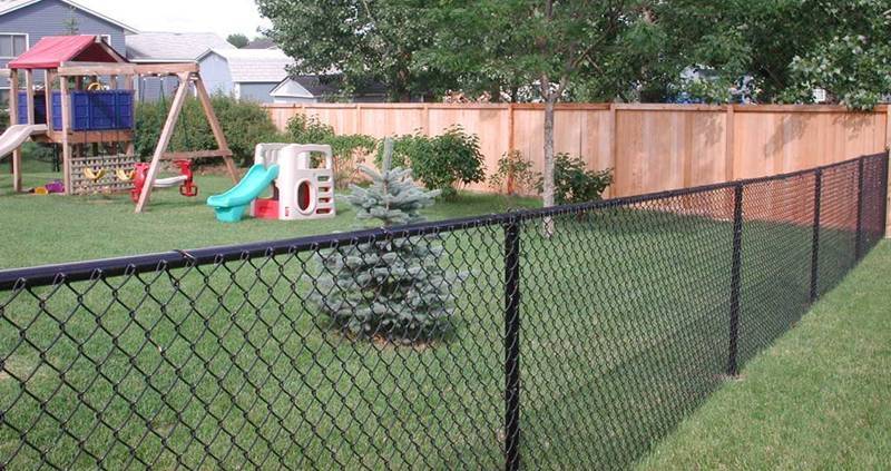 4-feet high black vinyl-coated chain link fencing for a playground.