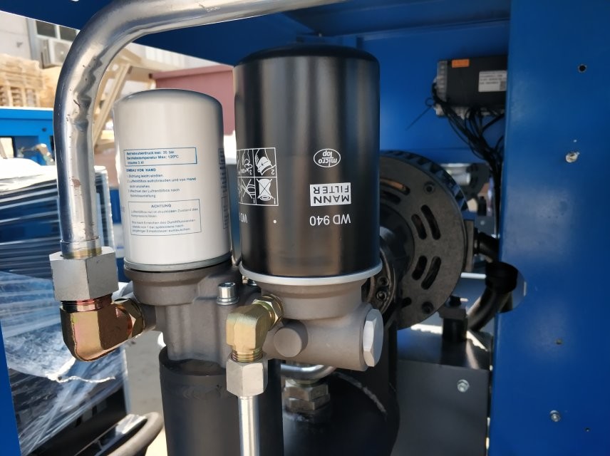 Compact screw air compressor with tank and air dryer mounted