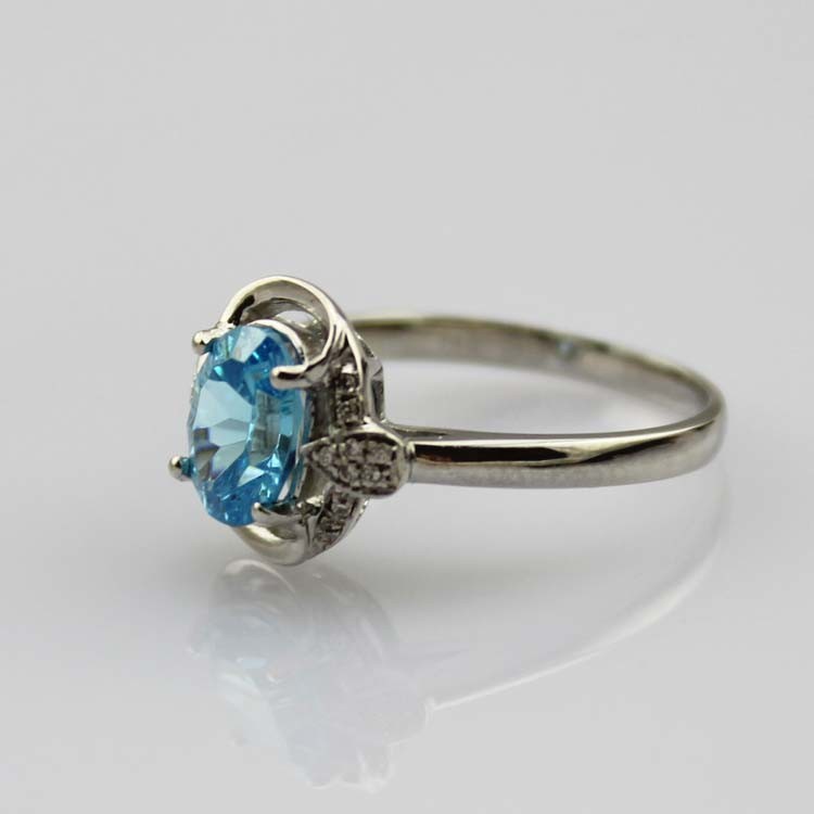 Fashion Jewelry 925 Silver 7x9mm Oval Blue Topaz Ring with Cubic Zircon(R106)