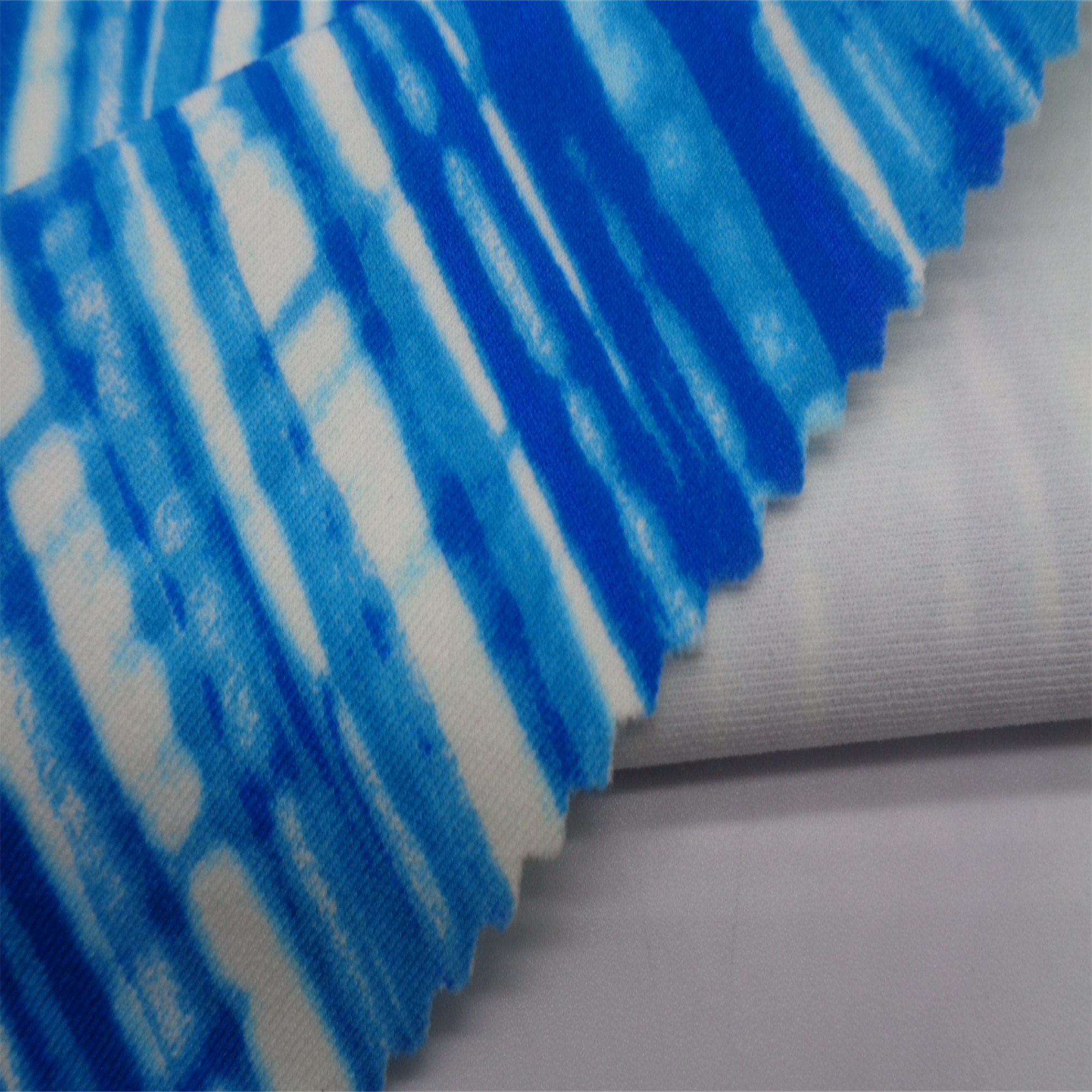 86% Nylon 14% Printed Sportswear Spandex Fabric 260gsm 140D+40D Width 150cm Windproof
