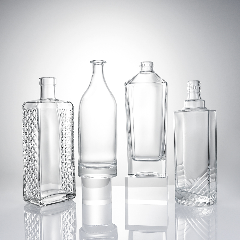 Clear Glass Liquor Bottle with Embossed Body and Cork Stopper