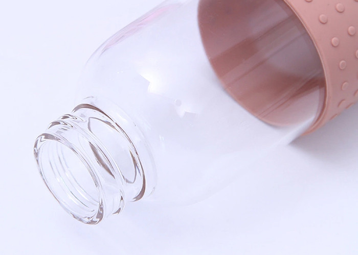 Round Glass Drinking Bottle With Silicone Sleeve Heat Resistant Feature