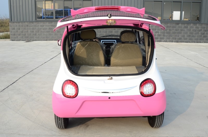 4 Wheels Drive White Body Mini Electric City Car With 2 Seats Good Climbing Ability