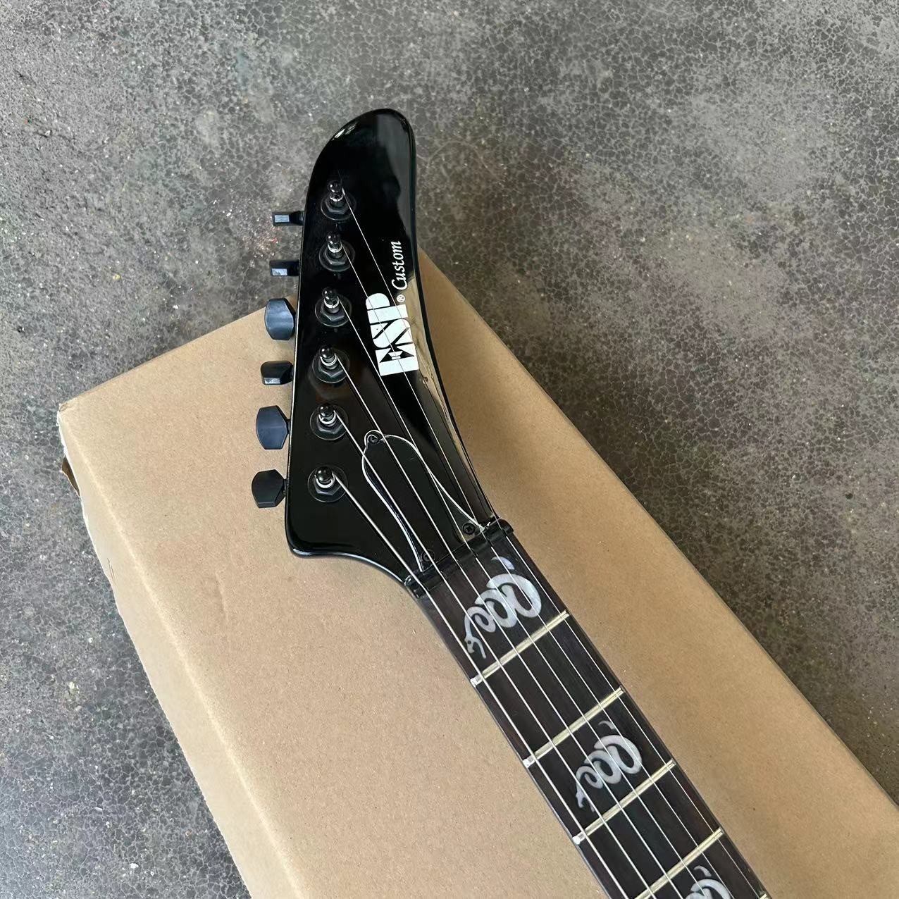 Custom special shape body ESP style electric guitar in black color glossing finish