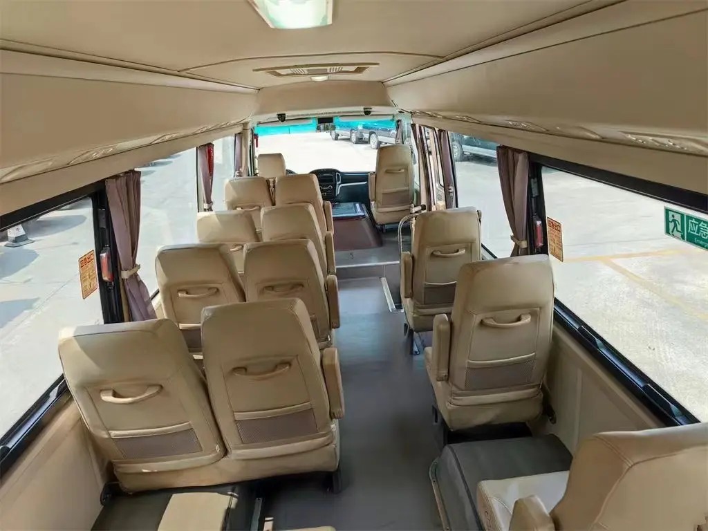 Second Hand Mini Bus Front Engine 19 Seats Golden Dragon Coaster External Swinging Door XML6700