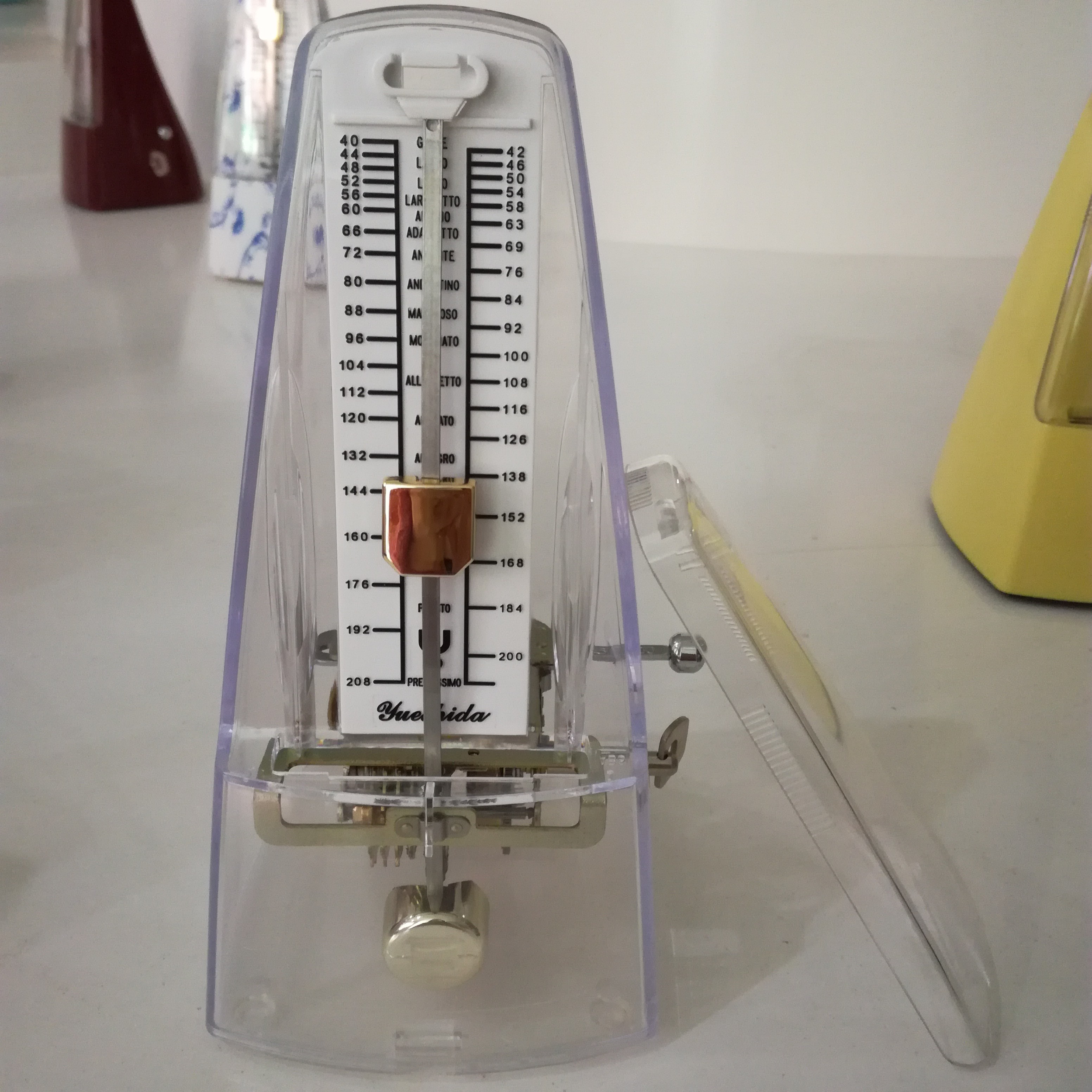china Factory price musical instrument accessories yinda mechanical metronome tuner for guitar/piano/voilin beginners