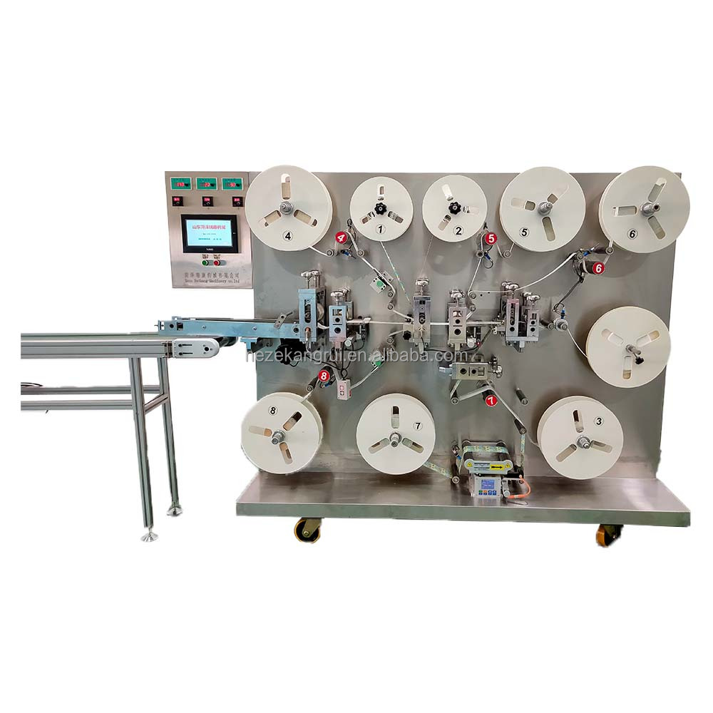 KC-2000-B Fully Automatic Motorized Cartoon First Aid Making and Packing Machine