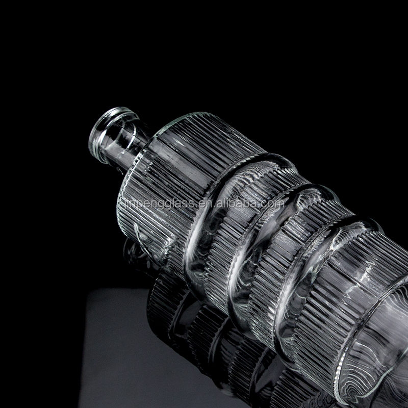 Customized Logo Clear 750ml Bar Top Emossed Snake Drawing Glass Bottle for Vodka Cylinder