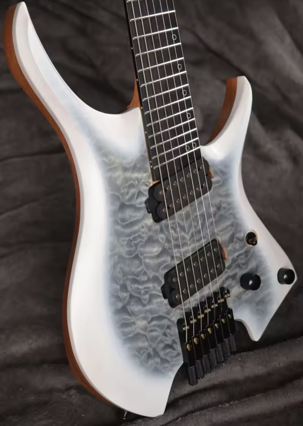 2025 Fanned Frets 7 Strings Headless Electric Guitar White Color with Eye Poplar 5-ply Roasted Maple