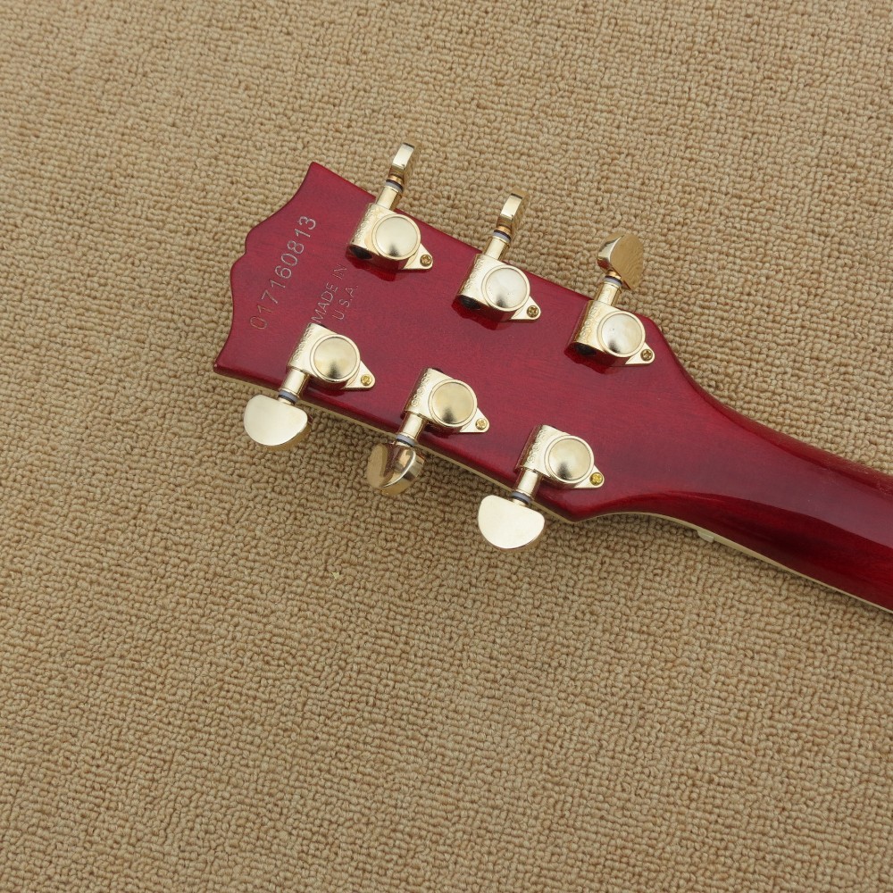 2017 hollow body electric guitar quilt flame on body top and back ,Natural wood color,gold hardware