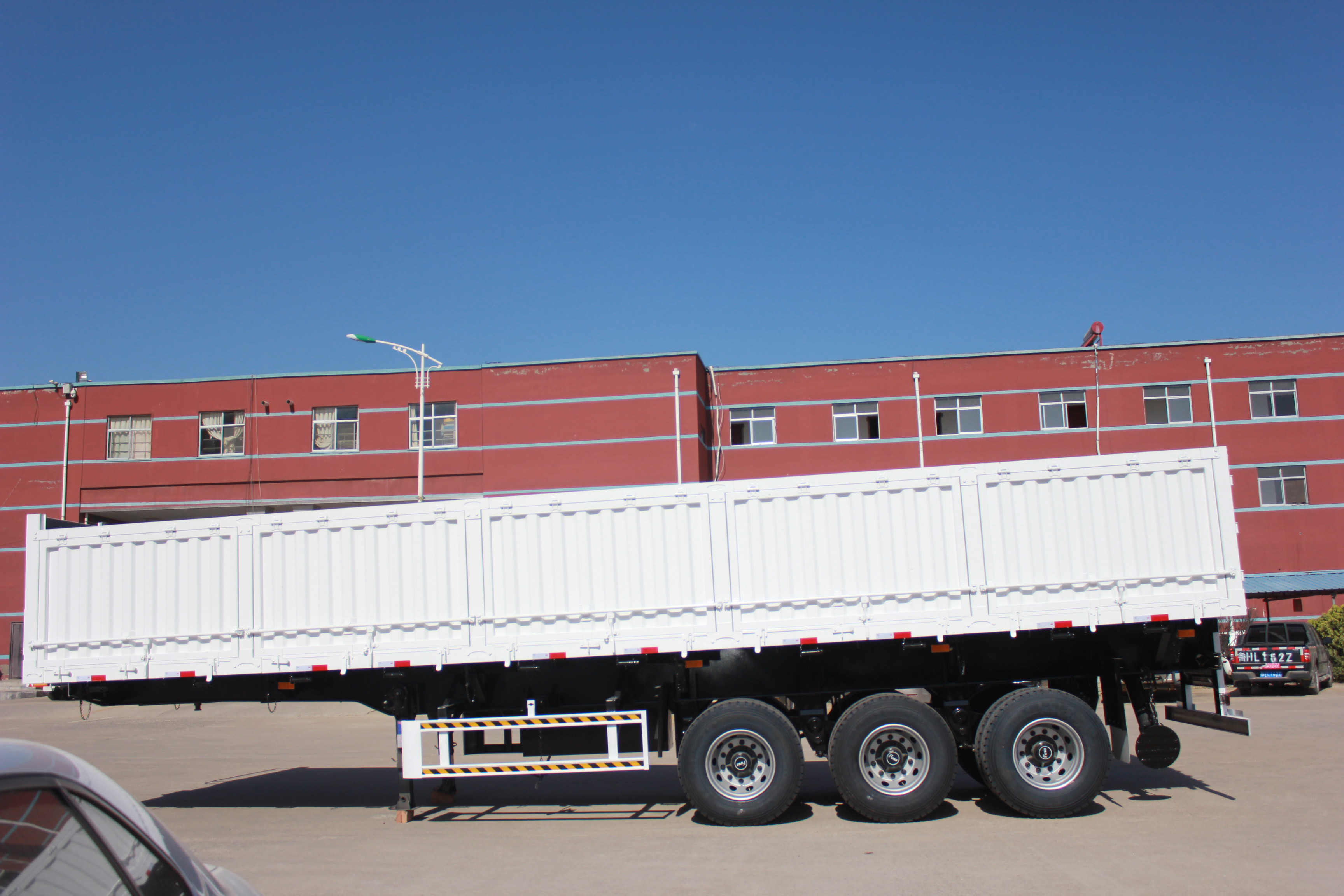 Low Bed Deck Dimension of 12000X2500X1500mm Dump Semi Trailer for Australia Market