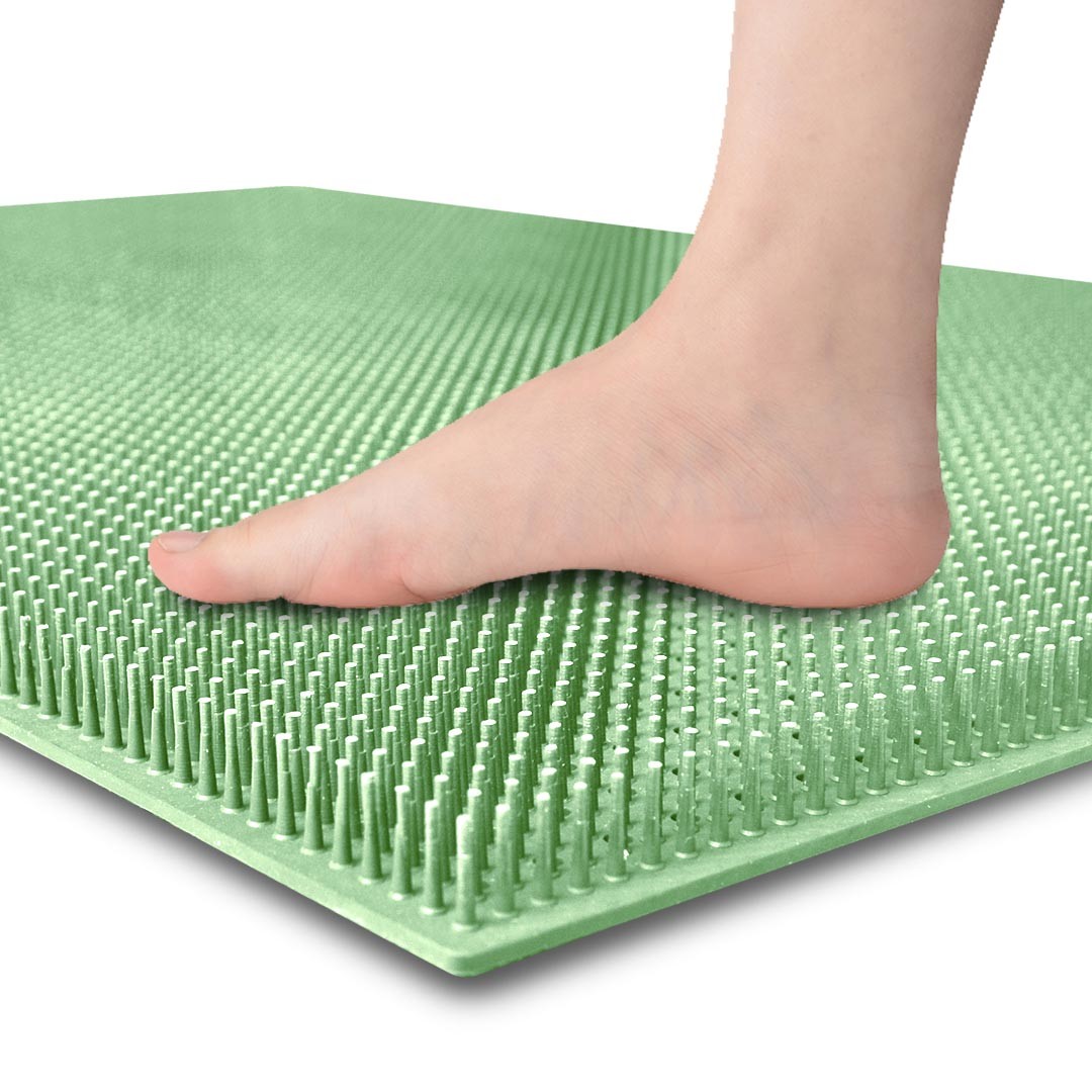Non toxic and non slip silicone shower foot massage pad in the gym bathroom