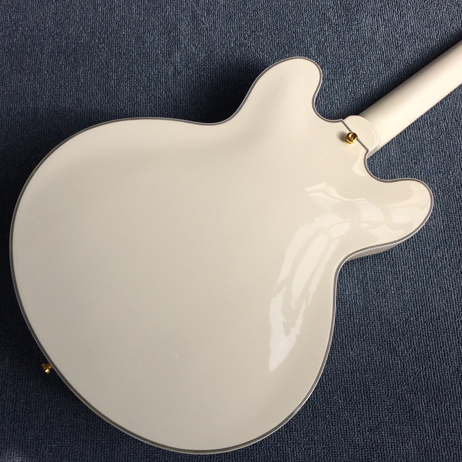 Hollow body jazz electric guitar, Double F holes,Ebony Fingerboard,Tremolo system,white guitar