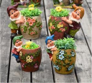 China Resin garden gnome elf figurine flower pot garden decoration on sale
