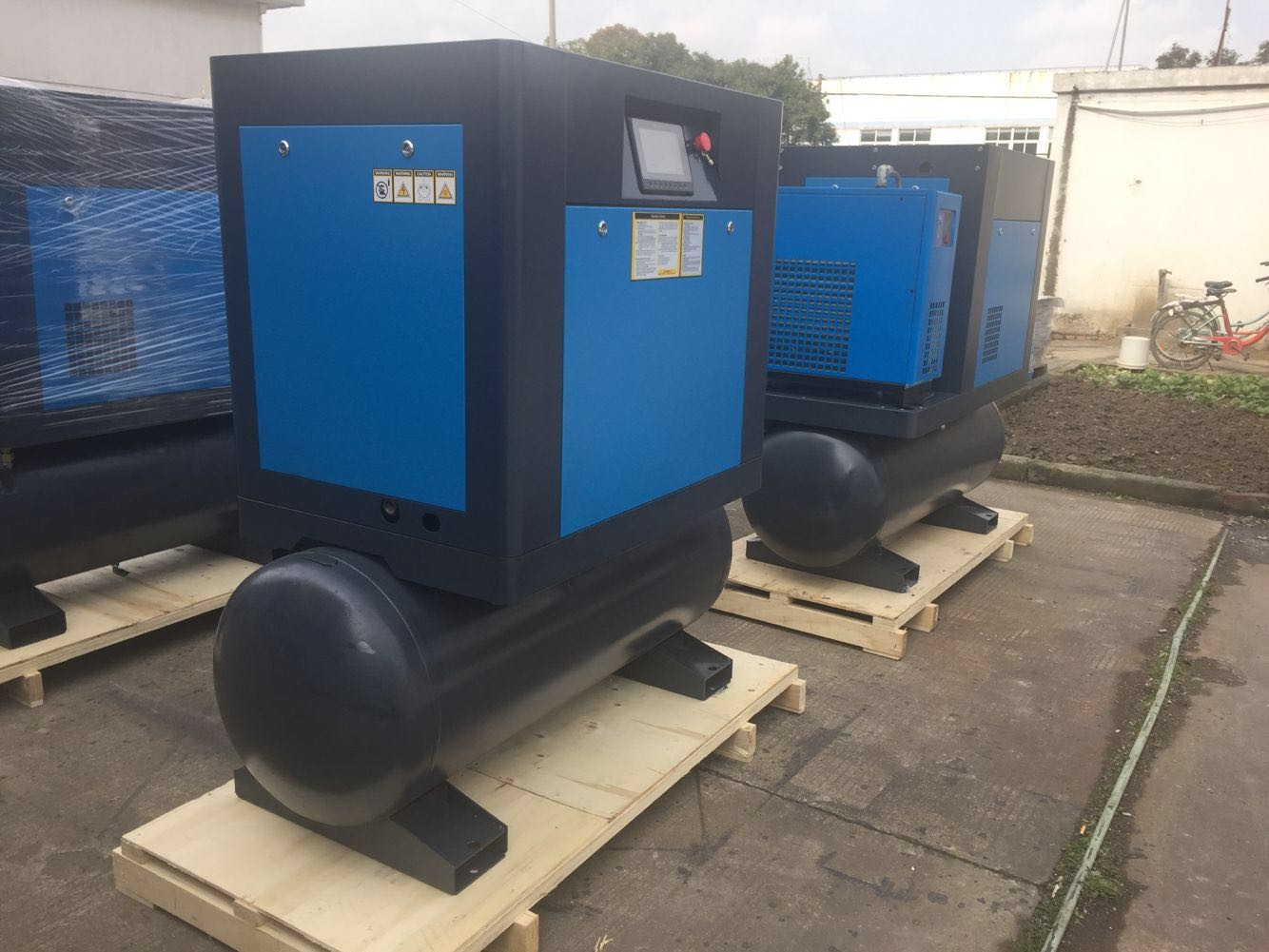 Compact screw air compressor with tank and air dryer mounted