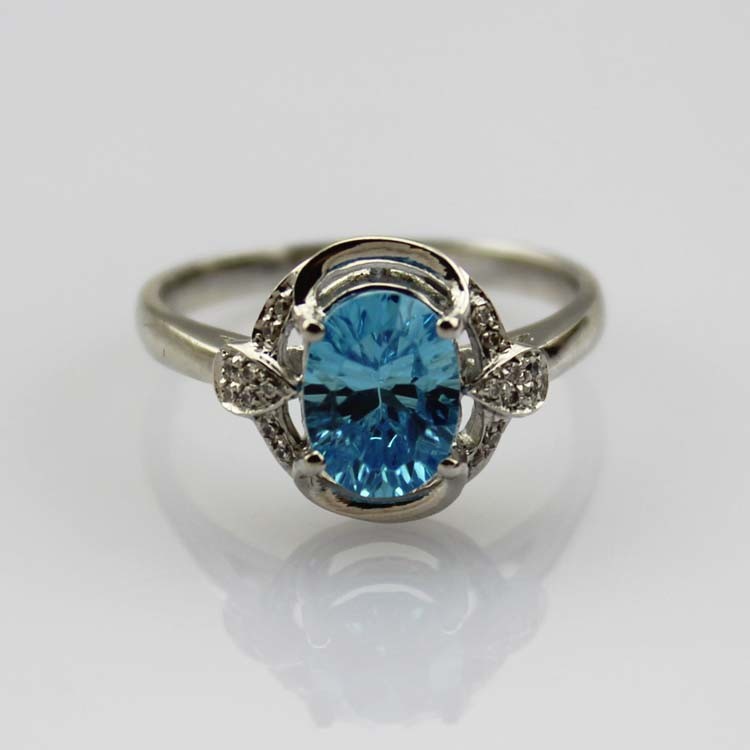 Fashion Jewelry 925 Silver 7x9mm Oval Blue Topaz Ring with Cubic Zircon(R106)