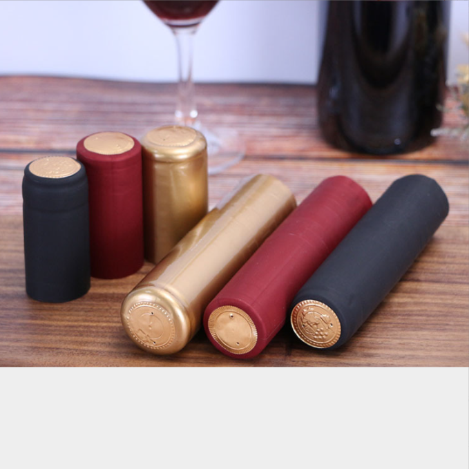 Customized Bottle Color Heat Shrink PVC Embossed Wine Bottle Cap with Bottle Stopper