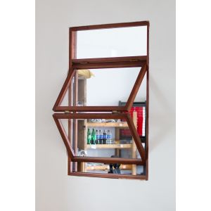 Studio-Optimized Folding Window Balancing Morning Sun Exposure with Afternoon