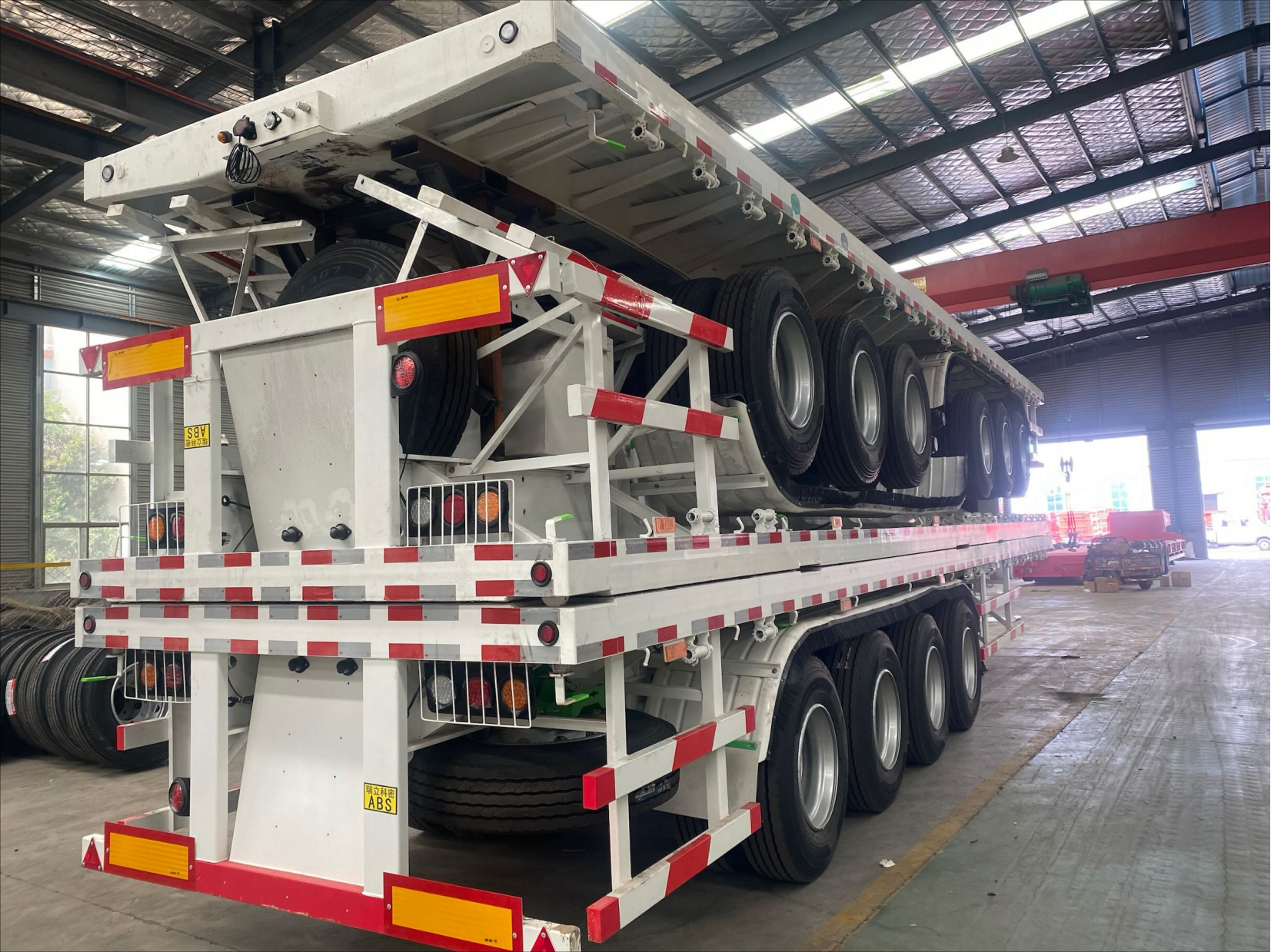 CIMC cheap 3 axles high Steel Cargo Hot Sale 20ft 40ft Container Chassis with lock Low Flat Deck transport Flatbed Semi Trailer