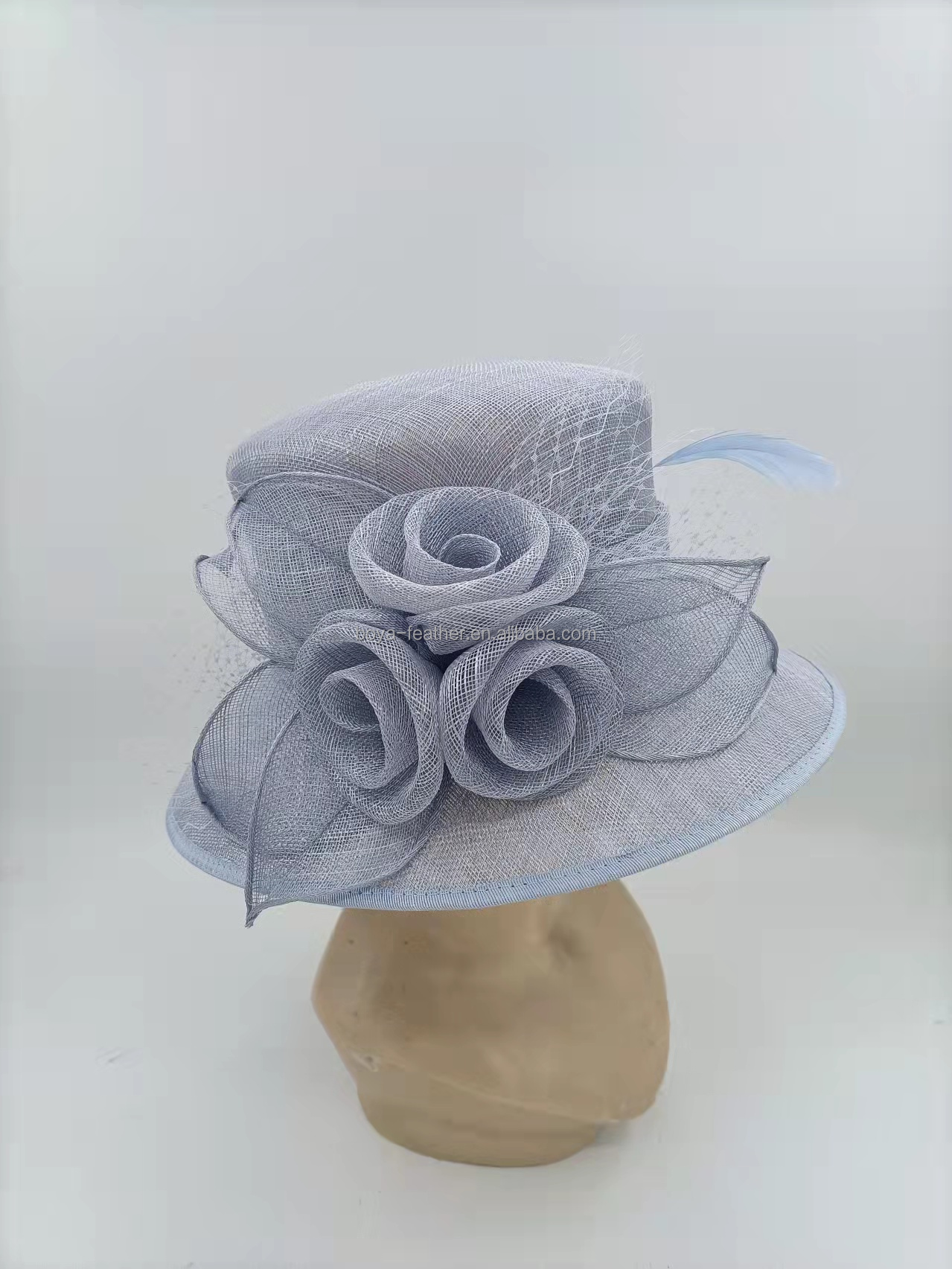 Make a Statement with this Sinamay and Feather Fascinator in Dyed Pattern