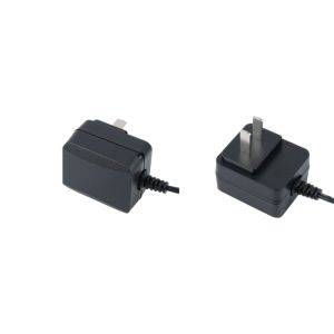 Ac Dc Portable Power Adapter With Interchangeable Plugs And Universal Optical