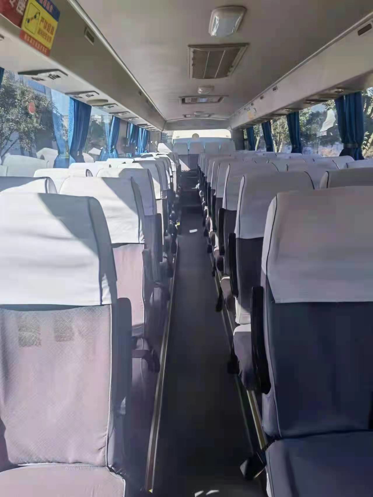 Higer Bus In Tanzania KLQ6129 Yutong Long Used Coach Buses 65 Seats RHD Front Engine 2+3 Layout Toyota Coaster Bus