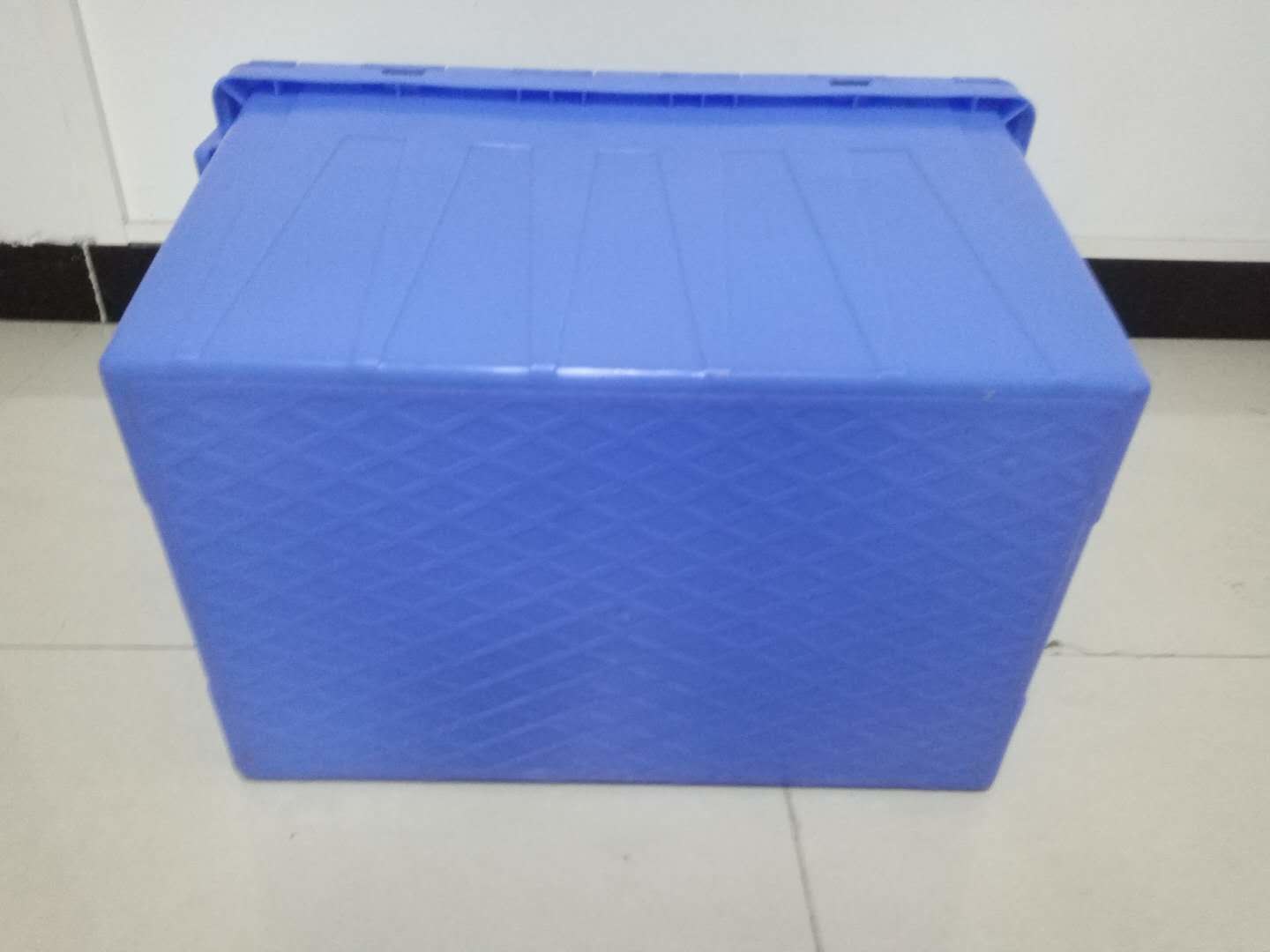 Yellow Plastic Storage Bins Attached Lids Stacked For Transportation