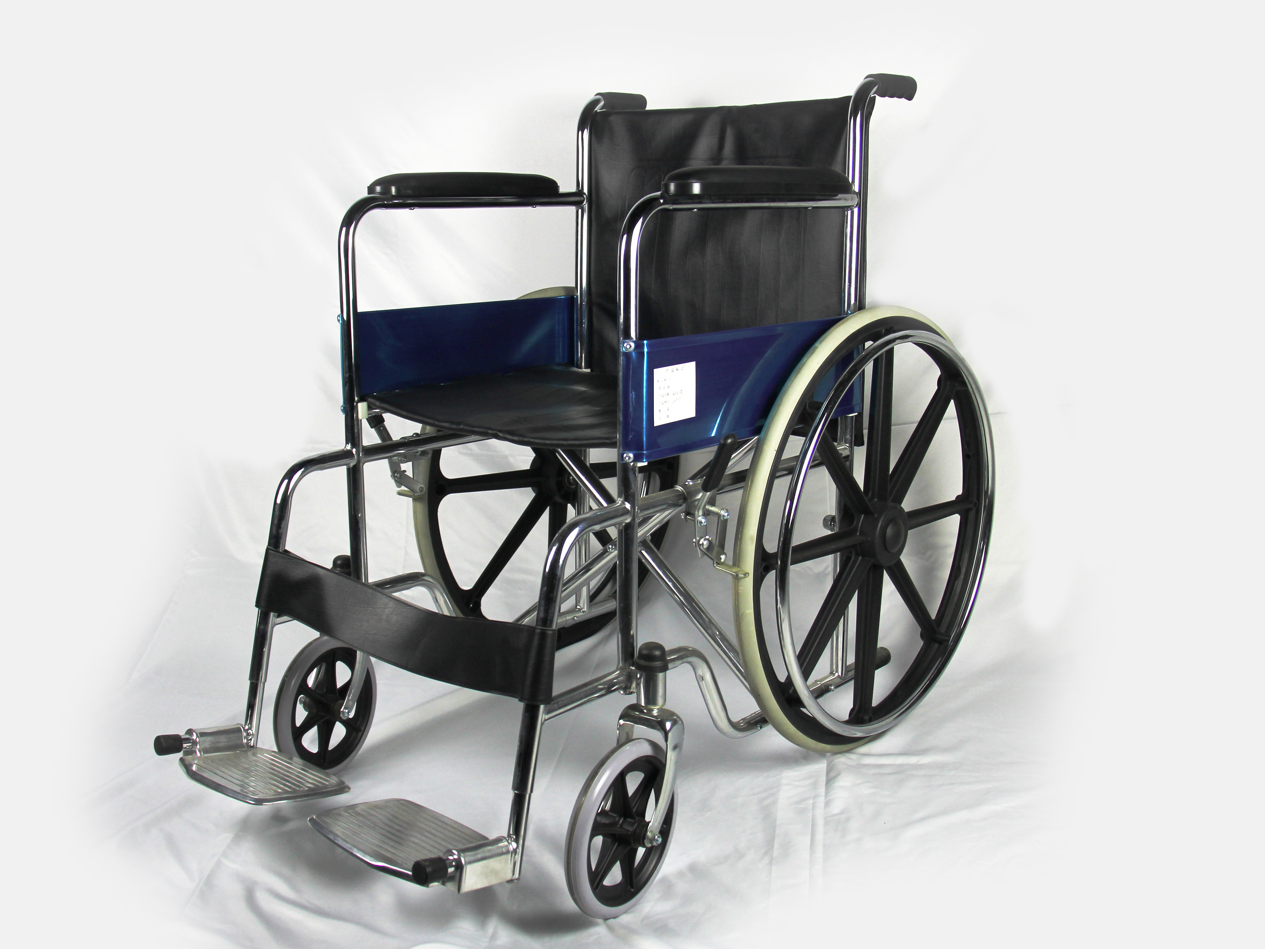 ISO Foldable Steel Wheelchair With Solid Castor Rear Wheel