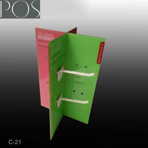 Acrylic counter top display with hooks for hanging on the table