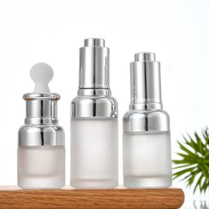  Round Glass Bottle Alu Dropper Essential Oil Bottle with Box Customize Luxury Oil Push Button Flat Shoulder 20ml 30ml 50ml Manufactures