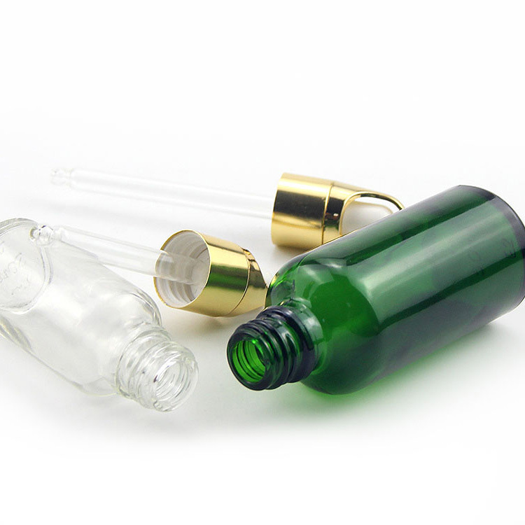 Customized Accepted Essential Oil Small Round Empty Shiny Silver Gold Dropper Oil Bottle with Unique Flower Basket Rubber