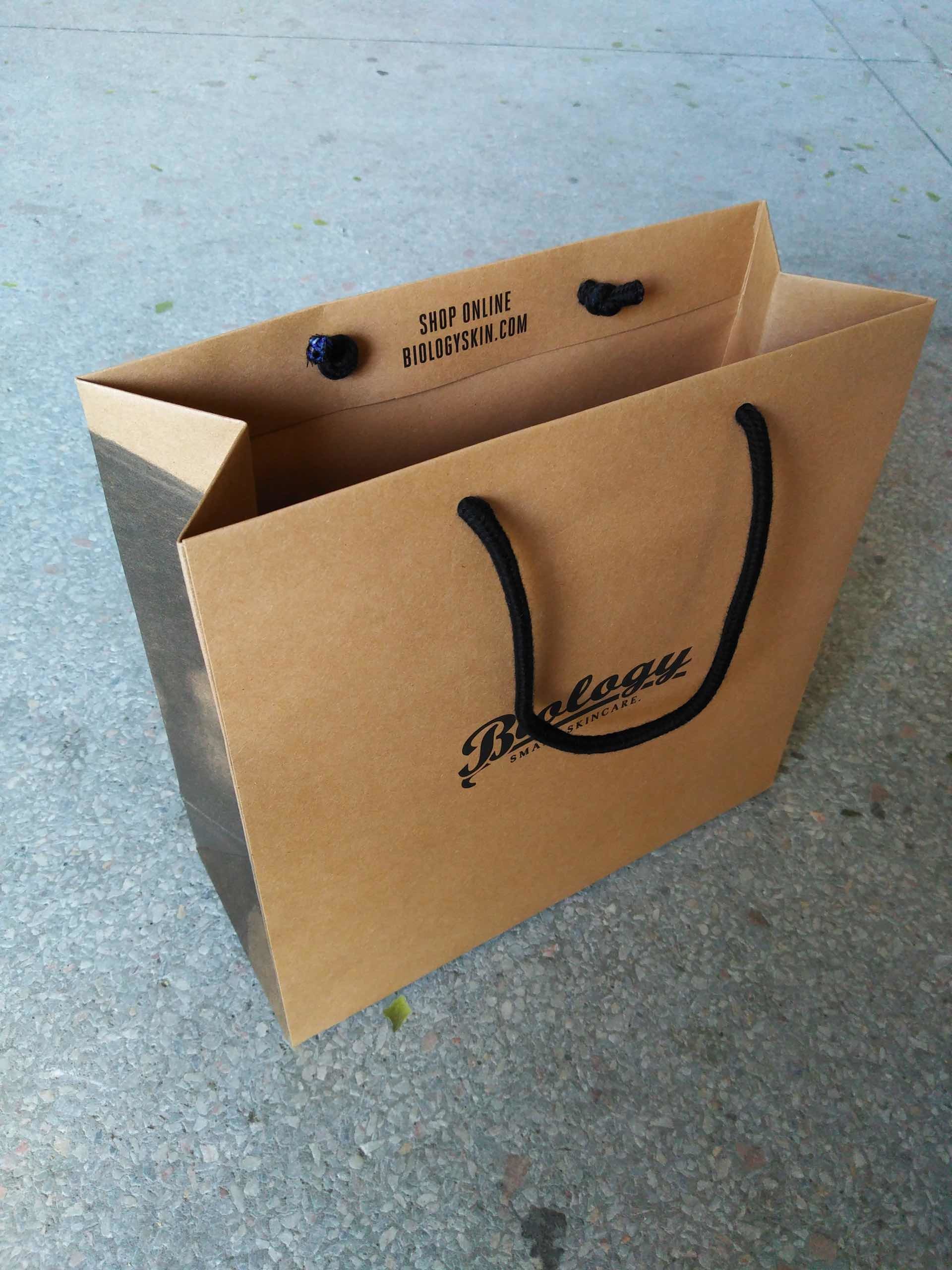 Eco-friendly durable customize paper shopping bags with cottom rope handle