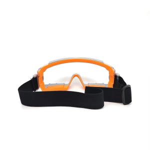Dual mold safety goggle that provides extra fog control and ventilation with an impact resistant lens