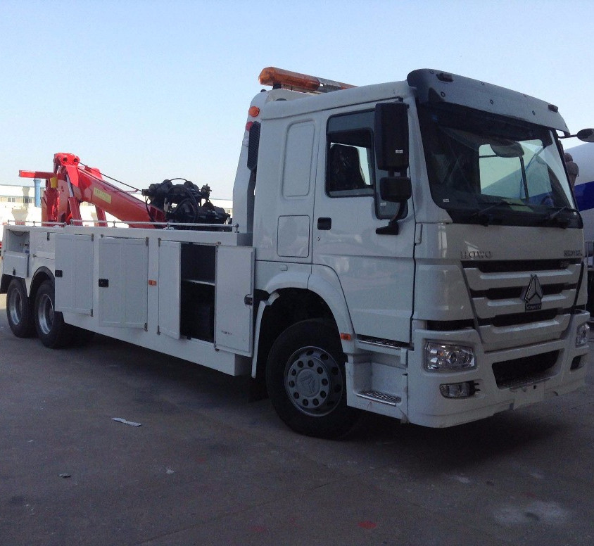 Hot sale 20 tons SINOTRUK 6*4 HOWO heavy duty road wrecker/towing truck recovery truck with rotation boom