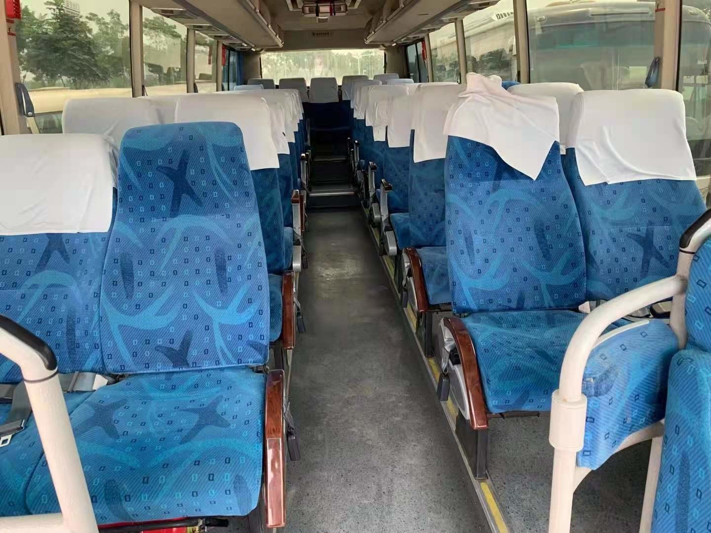 Used Golden Dragon Bus XML6897 Used Coach Bus 39 Seats Yuchai Rear Engine 180kw Airbag Chassis