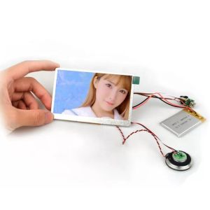 Button activated TFT LCD video module components for retail display fixture