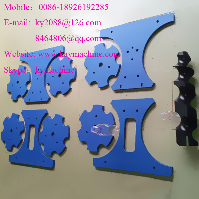Special screws able to turn and place triangular bottles in the required regular position. Rotator for pucks