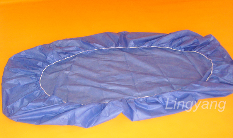 Disposable non woven bed sheet with elastic corner