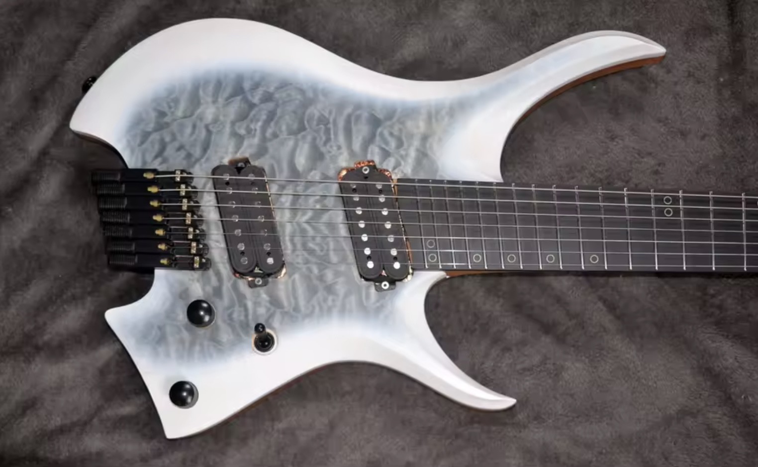 2025 Fanned Frets 7 Strings Headless Electric Guitar White Color with Eye Poplar 5-ply Roasted Maple