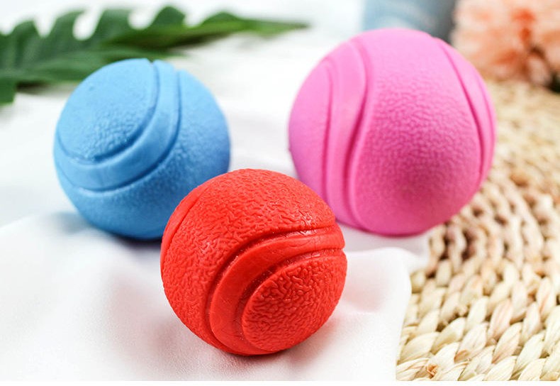 Dog Pet Treat Dispensing Ball Solid Rubber Chew Toy with Natural Rubber Material in Dark