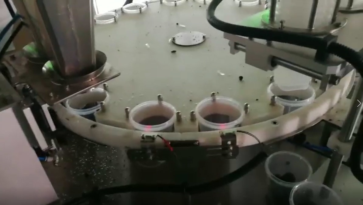 ODM Automatic Filling Machine Bottled Jars Cans Puffed Food Sweets Packing Rotary Cup Filling Sealing Machine