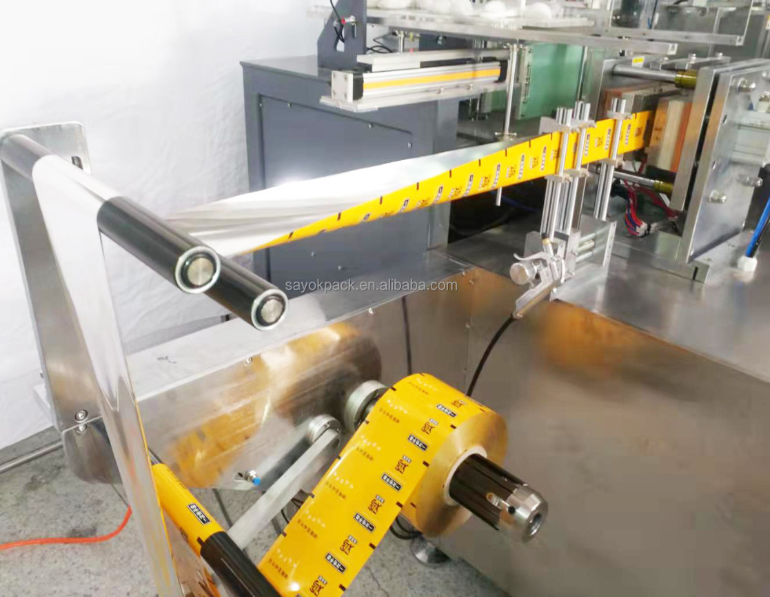 70PCS / Min Four Side Seal Packing Machine Disposable PE Glove 2 In 1 Packaging Machine