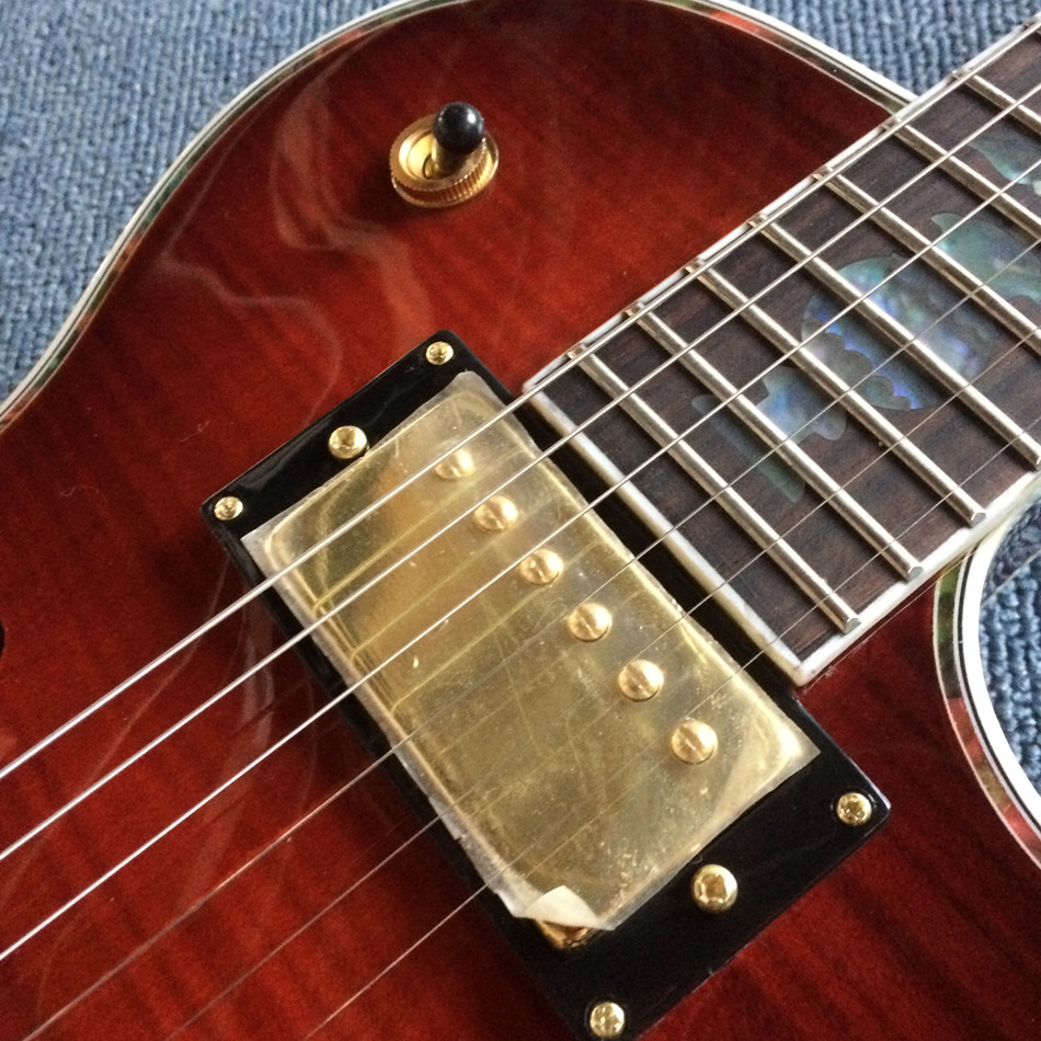 A new style of custom guitar, double F holes,Gold hardware,Flame Maple Top & Back
