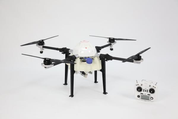 Small M4E Agricultural Pesticide Helicopter Multi-Rotors Sprayer Drone for