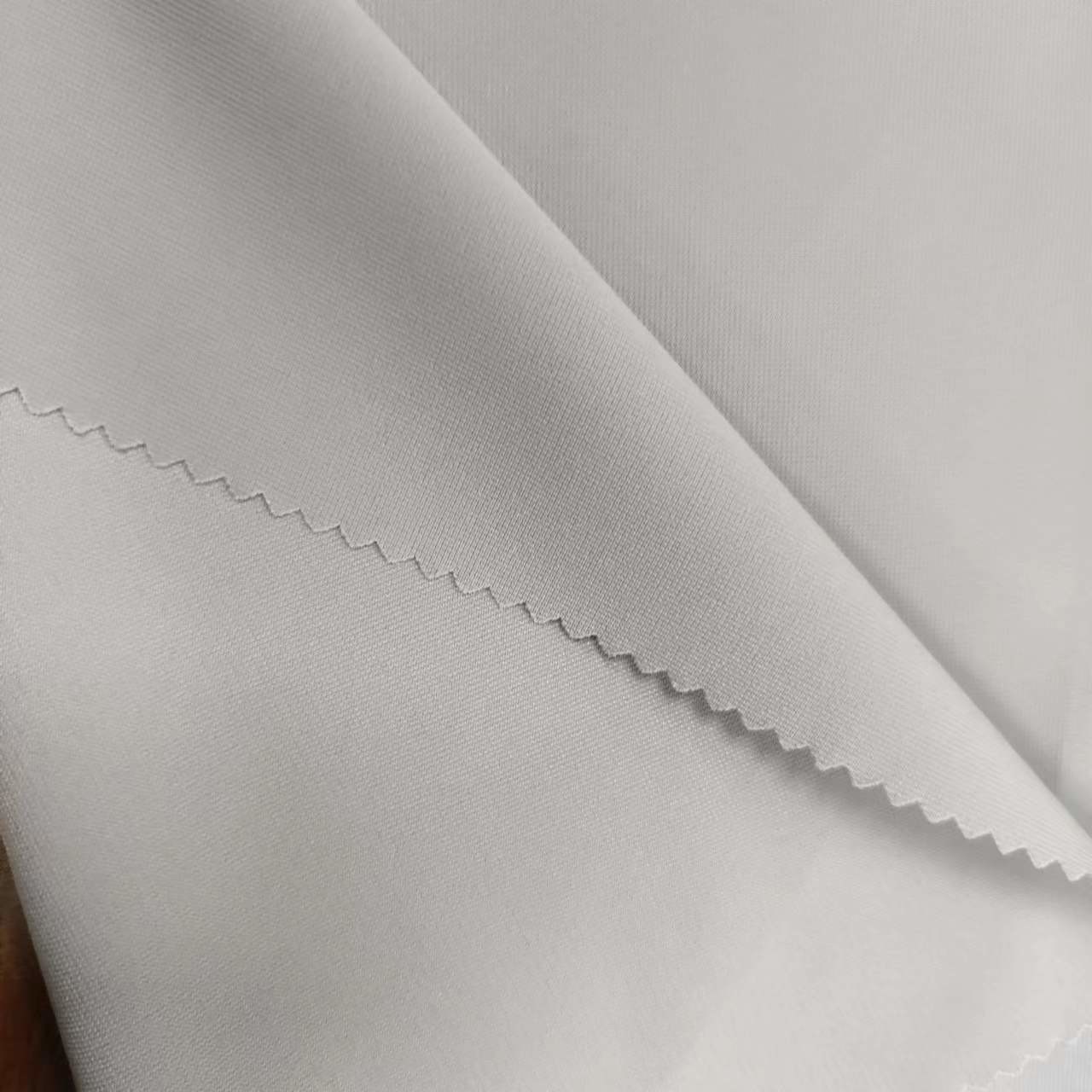 90% Polyester 10% Spandex Fabric Small Ripstop Grey Weft Woven 155G Sportswear