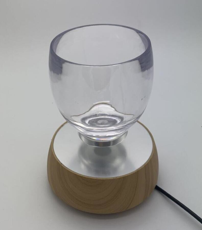 hotsale magnetic levitation transparent glass cup drink display stand