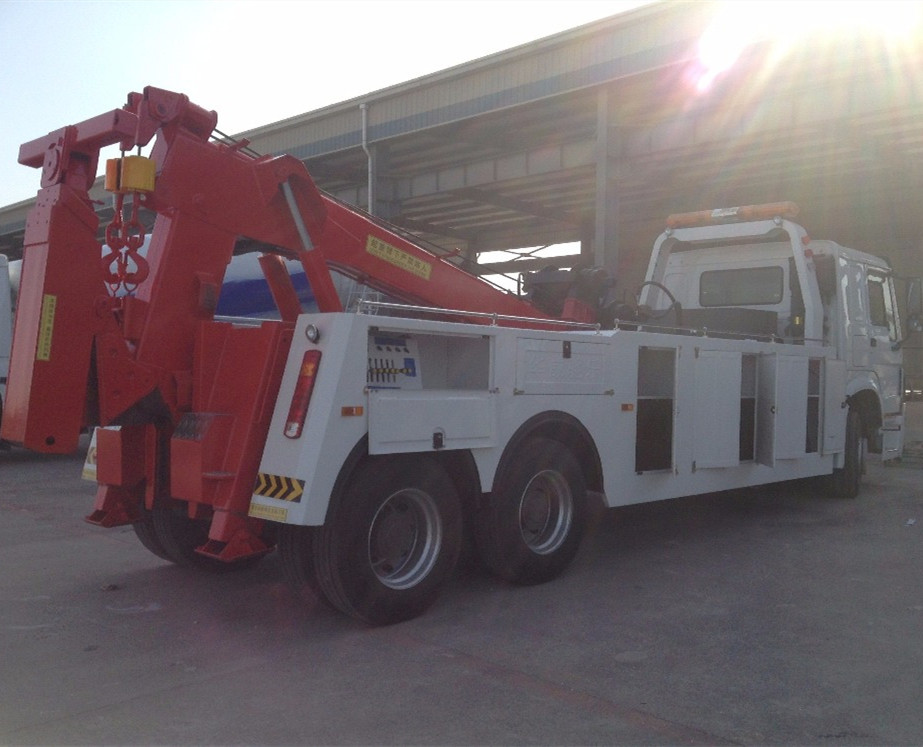 Hot sale 20 tons SINOTRUK 6*4 HOWO heavy duty road wrecker/towing truck recovery truck with rotation boom
