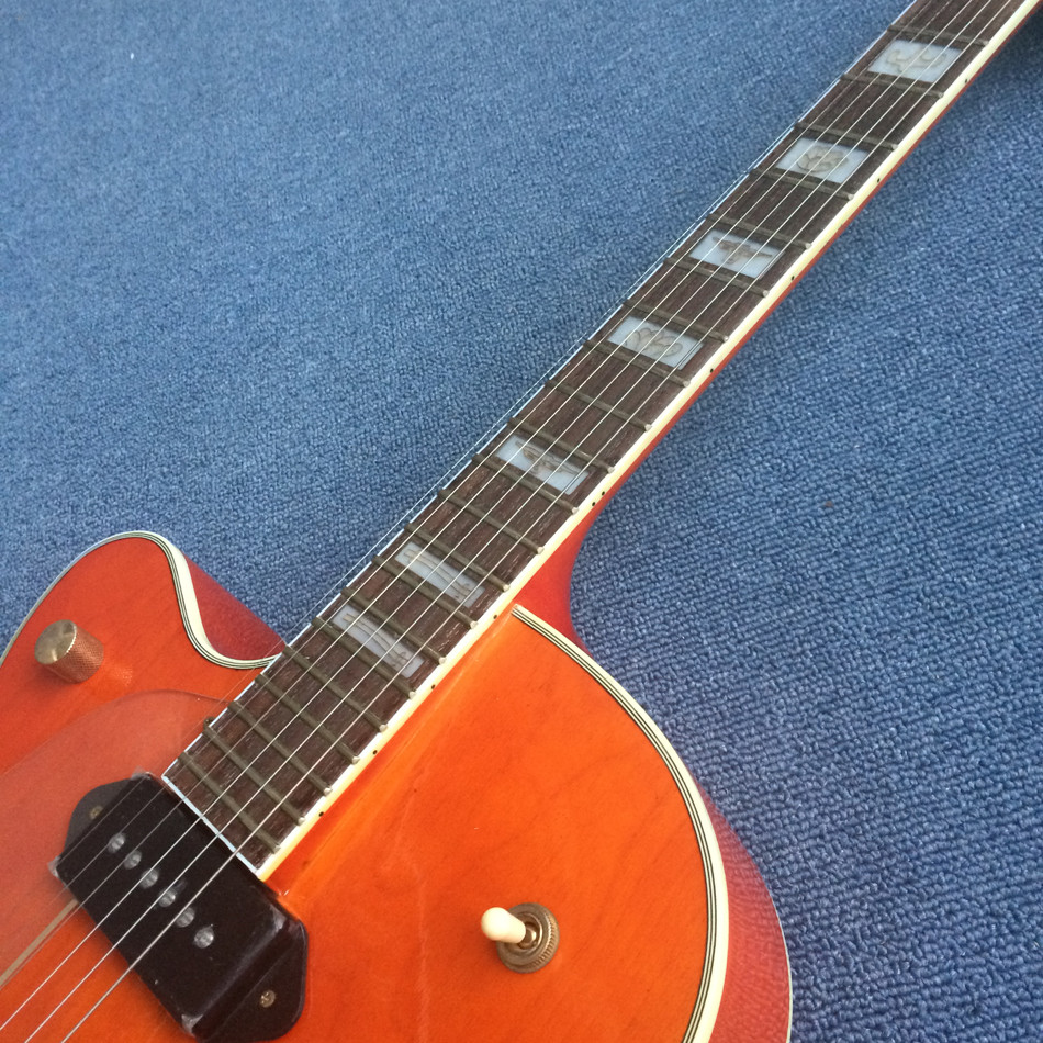 Hollow body jazz electric guitar, Double F holes,Ebony Fingerboard,Tremolo system,white guitar