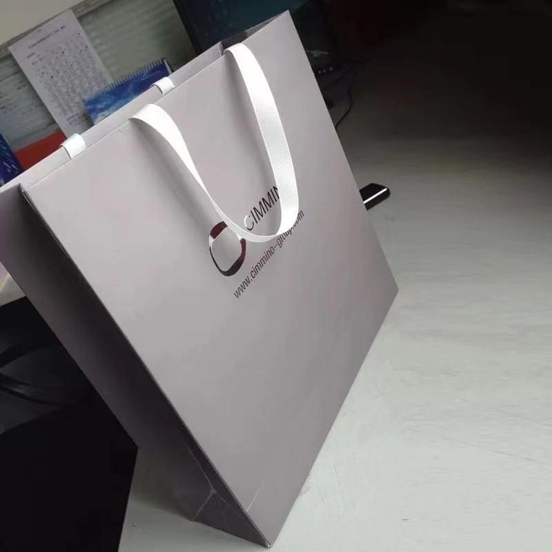 Ribbon Handle Apparel Paper Bag